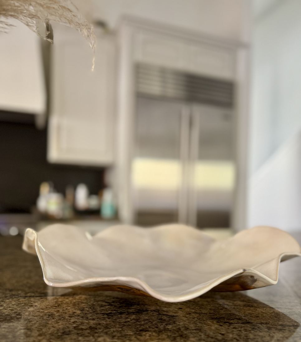 Wide white platter with a wavy ruffled rim